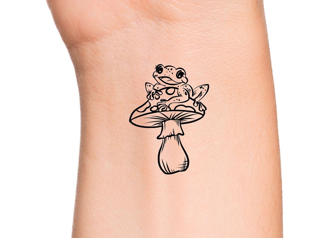 Tattoo of the Week Magic Frog and Her Magic Mushroom  Independent  Tattoo  Delawhere