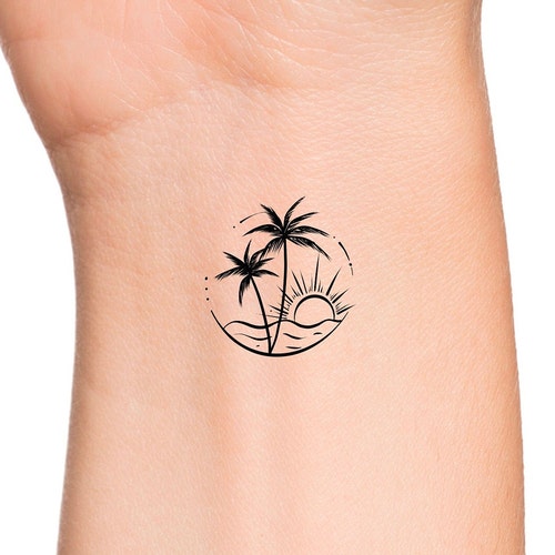 Floridian palm tree with sunset and surfboard in the sand  Sunset tattoos  Forearm band tattoos Palm tattoos