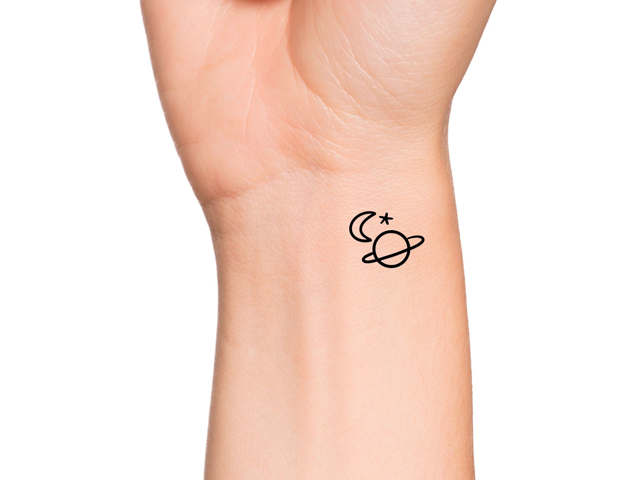 Little Saturn tattoo by Nadia Rose  Tattoogridnet
