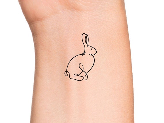 Rabbit tattoo by jasper andres - Tattoogrid.net