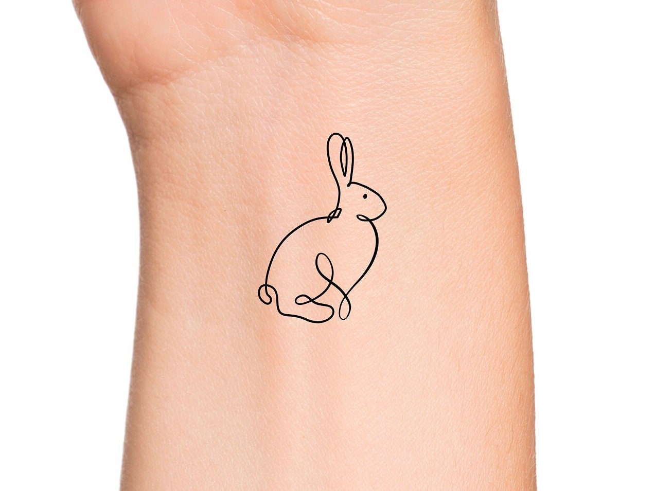 Tattoo uploaded by Tattoodo • Bunny tattoo by Minnie #Minnie #bunnytattoo  #illustrative #linework #fineline #realistic #bunny #rabbit #nature #animal  #cute #small #detailed • Tattoodo