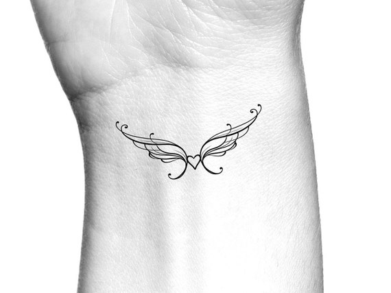 Simple Heart With Wings Tattoos