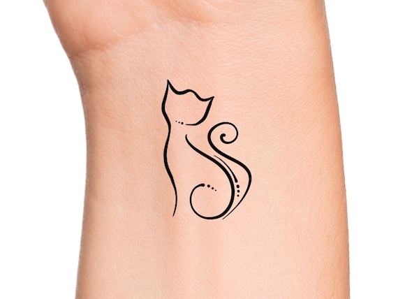 Simple Cat done by Nadine at Wimpernschwestern in Berlin Design by Eryl : r/ tattoos