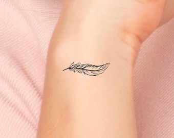 Heart Feather Tattoo  Feather Wrist Tattoo  neartattoos