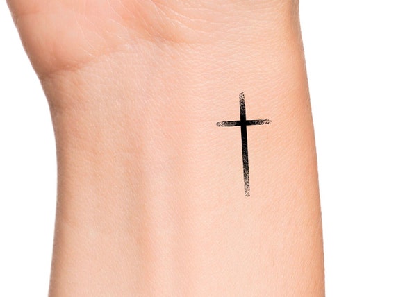 cross tattoo side wrist