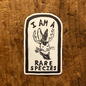 3" vinyl sticker - I am a rare species - ivan coyote - linocut design - weatherproof sticker