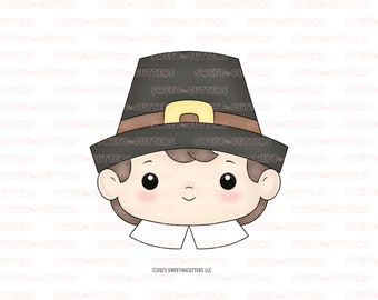 May include: A cartoon illustration of a pilgrim boy wearing a brown hat with a gold buckle and a white collar. The boy has brown hair, brown eyes, and a smiling face.