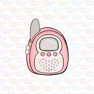 May include: A pink baby monitor cookie cutter with a white screen, three buttons, and a textured speaker. The cutter has a small antenna on top and a white handle.