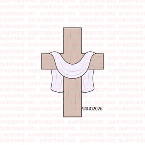 May include: A light brown wooden cross with a white draped cloth. The cross has visible wood grain. The white cloth is draped over the horizontal beam. The text "S4UCI2026" is visible on the bottom right.