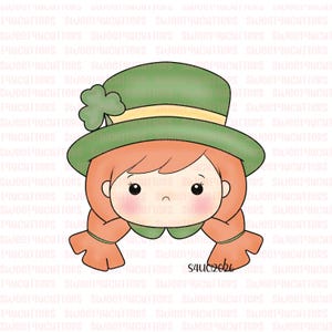 May include: A cartoon image of a girl wearing a green leprechaun hat with a shamrock. The girl has red hair in pigtails and a light skin tone. The image is a cookie cutter design.
