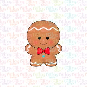 May include: A gingerbread man cookie cutter with a white icing smile, white icing eyes, and a red bow tie. The cookie cutter is brown and has a white icing design on the top of the head.