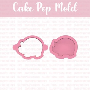 May include: Two pink pig-shaped cake pop molds. One is an outline, and the other is solid. The words "Cake Pop Mold" are in white script at the top. The background is a light pink color.