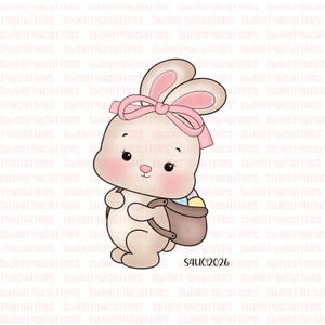 May include: A cartoon illustration of a cute bunny holding a basket of Easter eggs. The bunny is light beige with a pink bow and blush. The basket is brown, and the eggs are pastel colors. The image has the text "Sweet4cutters" repeated in the background.