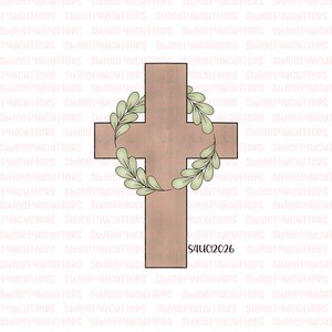 May include: A brown cross-shaped cookie cutter with a light green leaf wreath. The cutter has a simple design, perfect for making Easter or religious-themed cookies. The text "S4UC12026" is printed on the bottom right.