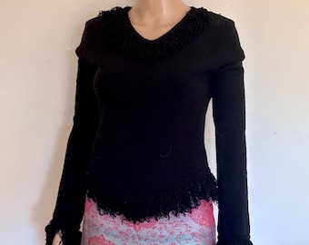 Suéter de punto negro vintage marca Black Market, talla M, ribete de hilo, mangas largas, frente asimétrico, muy buen estado