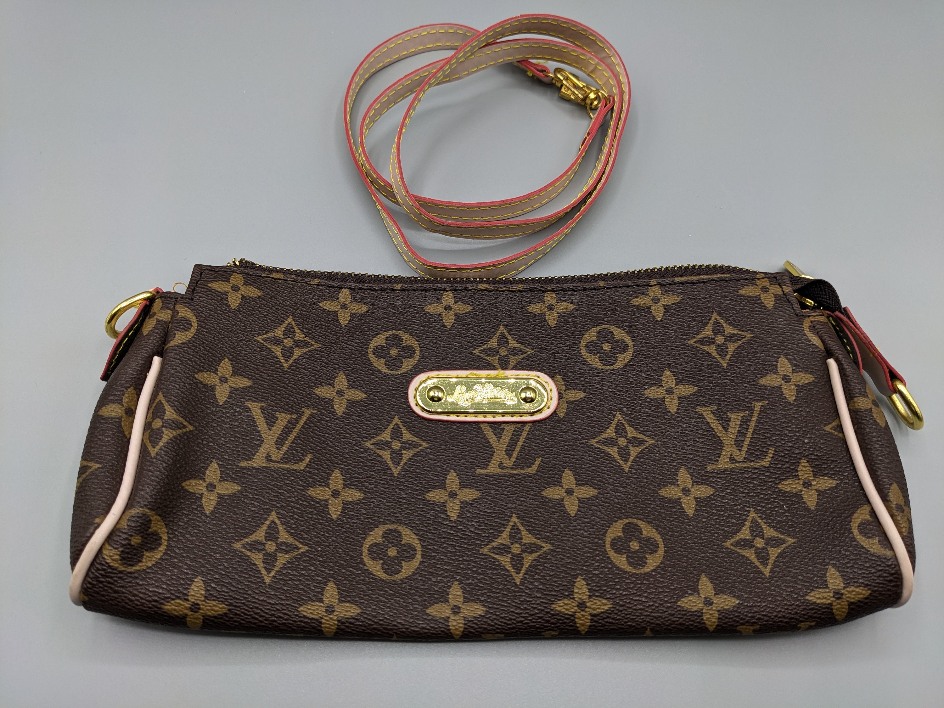 LOUIS VUITTON Monogram Pochette Eva Clutch Shoulder Bag - 30% Off