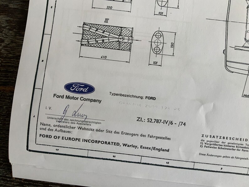 Puede incluir: Documento en blanco y negro con el logotipo de Ford Motor Company y el texto "Typenbezeichnung: FORD GRANADA 2500 125 25 ZI: 52.787-IV/6 - 174 FORD OF EUROPE INCORPORATED, Warley, Essex/England"