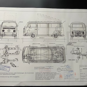 May include: A black and white technical drawing of a Volkswagen bus with a pop-up roof. The drawing includes detailed measurements and specifications for the vehicle. The text on the drawing reads "Westfalia Werke,  Westfalia, 71 011 1/14 6-75 / 3001/75".