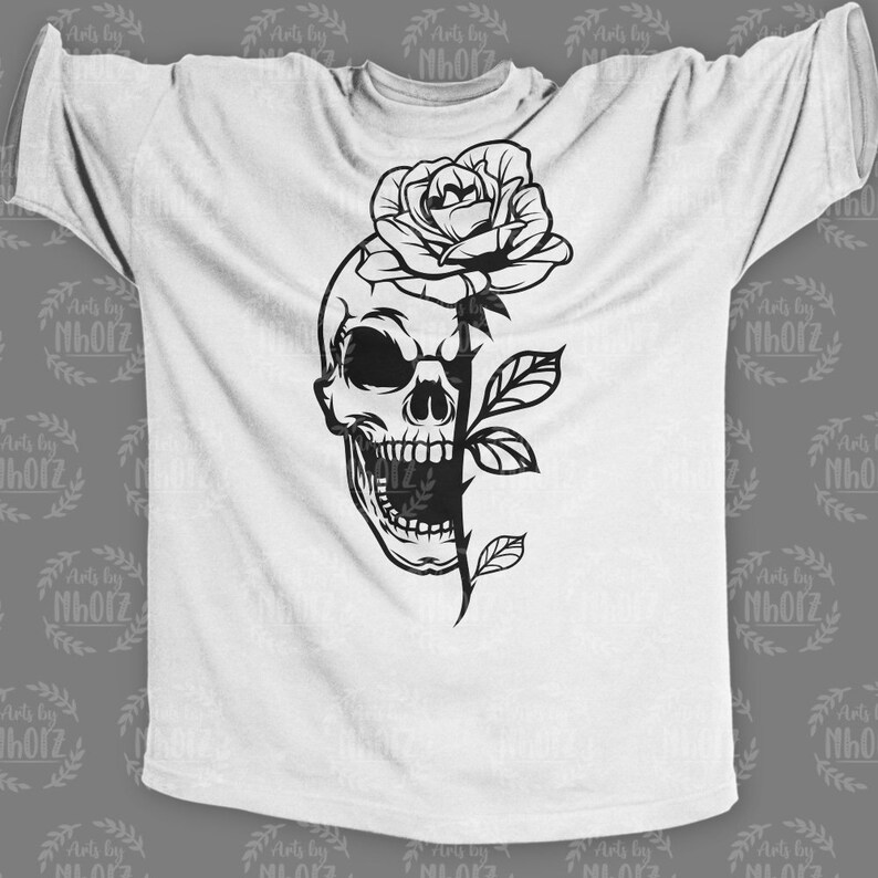 May include: A black and white illustration of a skull with a rose growing out of its head. The skull is open-mouthed and the rose is in full bloom.