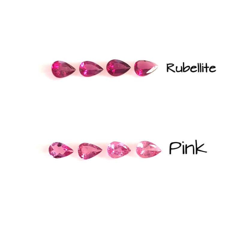 May include: Two rows of pear-shaped gemstones. The top row is labelled "Rubellite" and the bottom row is labelled "Pink".
