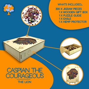 May include: A wooden jigsaw puzzle set featuring a colorful lion design. The set includes 300 pieces, a wooden gift box, puzzle guide, easel, and hemp protector. The box is labeled "Caspian the Courageous, The Lion."