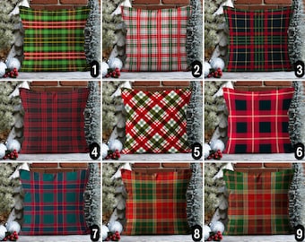 May include: Nine different plaid pillow covers with various color combinations, including red, green, blue, and black. The pillow covers are arranged in three rows of three.