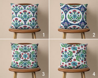 May include: Four brown chairs with cushions featuring different patterns of blue, green, red, and white floral designs. The patterns are inspired by traditional Turkish tile designs.