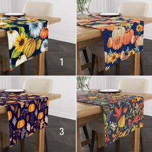 May include: Four table runners with different autumn-themed designs. Each runner features a dark blue background with various fall elements, including pumpkins, leaves, and sunflowers. The runners are numbered 1 through 4.
