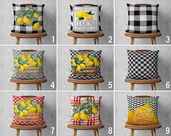 May include: Nine different pillow designs featuring lemons and black and white checkered patterns. Some pillows have the text "When life gives you lemons make something sweet" and "When life gives you lemons make lemonade".