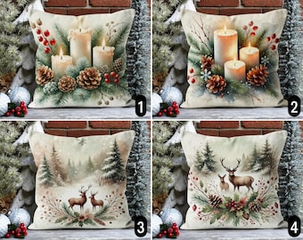 May include: Four different Christmas cushion designs. The first cushion features a winter scene with candles and pine branches. The second cushion features a winter scene with deer and pine branches. The third cushion features a winter scene with a snowy forest. The fourth cushion features a winter scene with a snowy forest and deer.