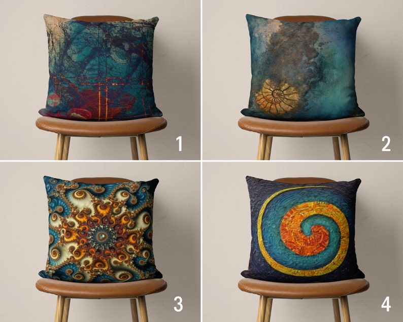May include: Four different throw pillow designs featuring abstract patterns in shades of blue, orange, yellow, and brown. The pillows are displayed on brown chairs with wooden legs.