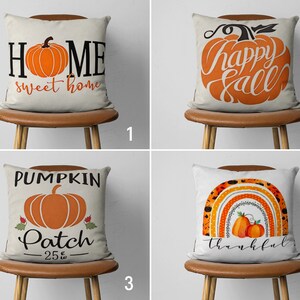 May include: Four different throw pillow designs featuring fall themes. The first pillow has the text "Home sweet home" with a pumpkin in the center. The second pillow has the text "happy fall" with a pumpkin in the center. The third pillow has the text "Pumpkin Patch - 25¢" with a pumpkin in the center. The fourth pillow has a rainbow with the text "thankful" and two pumpkins at the top of the rainbow.