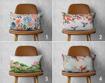 May include: Four different throw pillow designs with floral and bird patterns. The pillows are on brown chairs with a white brick background.