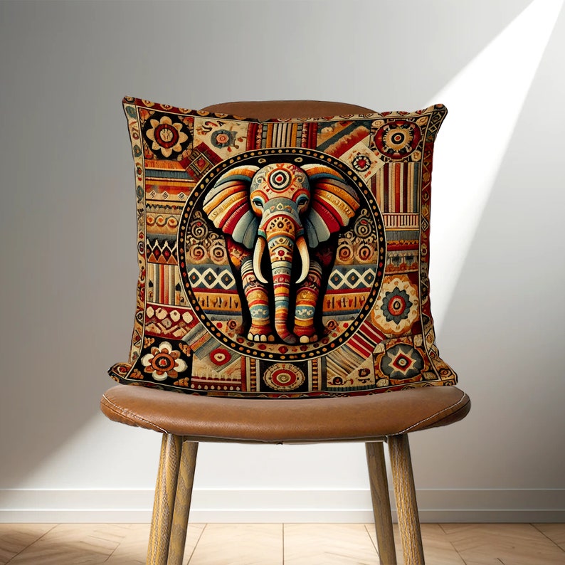 May include: A colorful throw pillow with a geometric pattern featuring an elephant in the center. The elephant is decorated with intricate details and vibrant colors.