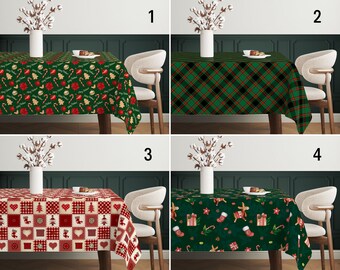 May include: Four different Christmas tablecloths with various patterns. The tablecloths are green, red, and white with holiday-themed designs. The tablecloths are displayed on tables with chairs in a room with dark wood walls.
