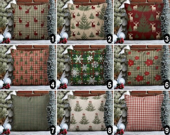 May include: Nine different Christmas pillow designs with various patterns and colors. The pillows feature red, green, white, and brown colors with patterns of plaid, snowflakes, trees, and reindeer.