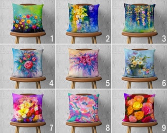 May include: Nine different floral pillow covers with various flower arrangements and colors. The pillow covers are displayed on wooden chairs with a white background.