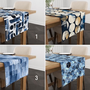 May include: Four different table runners with geometric patterns. The table runners are blue, white, and gold. The table runners are on wooden tables with chairs.
