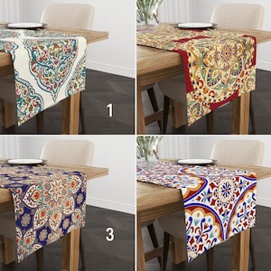 May include: Four different table runners with intricate, colourful patterns. The runners are made of fabric and feature a variety of geometric and floral designs. The runners are shown on wooden tables with place settings.