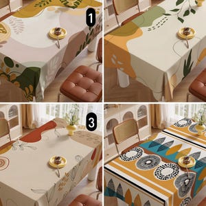 May include: Four rectangular tablecloths with abstract designs. Each tablecloth features a different pattern of organic shapes and colors, including green, orange, and brown, on a neutral background. The tablecloths are displayed on tables with chairs.