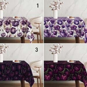 May include: Four tablecloths with different floral patterns. The tablecloths feature a watercolor-style design of purple tulips on a white, purple, dark purple, or black background.