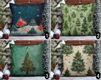 Puede incluir: Cuatro fundas de cojín de Navidad diferentes con varios diseños con árboles de Navidad verdes y rojos. Las fundas de cojín son todas rectangulares y tienen un fondo blanco.