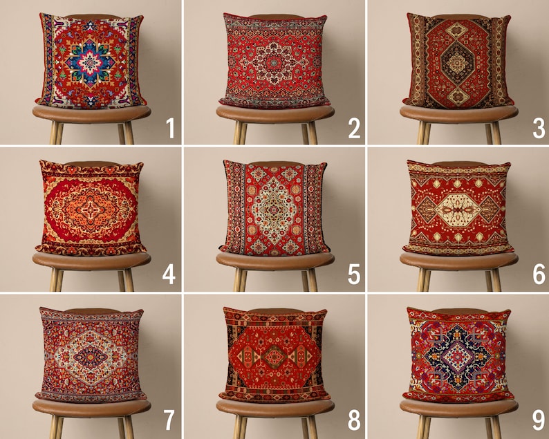 May include: Nine different throw pillows with red, orange, and blue patterned designs. The pillows are on chairs with wooden frames.