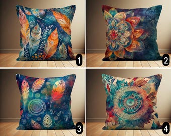 May include: Four decorative throw pillow covers with different colorful patterns. The first pillow features a blue background with colorful feathers. The second pillow has a blue background with a large colorful mandala. The third pillow has a blue background with colorful feathers and a mandala. The fourth pillow has a blue background with a large colorful mandala.