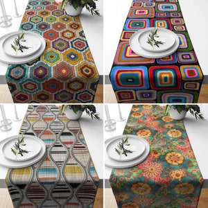 May include: Four different table runners with various geometric and floral patterns. The runners are in a variety of colors, including blue, green, red, yellow, and white.