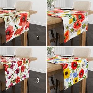 May include: Four different floral table runners with a white background and colourful flowers. The runners are shown on wooden tables with chairs. The runners are numbered 1 through 4.