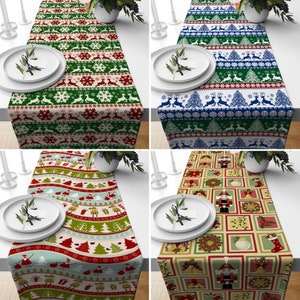 May include: Four different table runners with festive themes. The first runner is green with red and white accents and features a reindeer design. The second runner is blue with white accents and features a snowflake design. The third runner is red and green with a Christmas tree design. The fourth runner is yellow with red and green accents and features a nutcracker design.