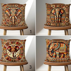 May include: Four decorative throw pillows with colorful patterned designs featuring an elephant motif. The pillows are displayed on brown chairs with a light background.