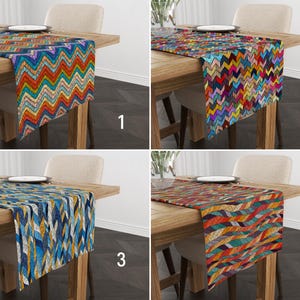 May include: Four table runners with geometric patterns are shown on wooden tables. The runners display zig-zag and abstract designs in various colour palettes, including blue, orange, and purple. Each runner is draped over a table, showcasing the fabric's texture and design.