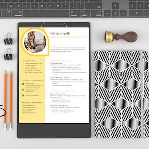 May include: A yellow and white resume with a photo of a person in the top left corner. The resume is for Harry Loveth, Project Management Analyst. The resume includes sections for My Expertise, Work Experience, Educational History, and Personal Reference.